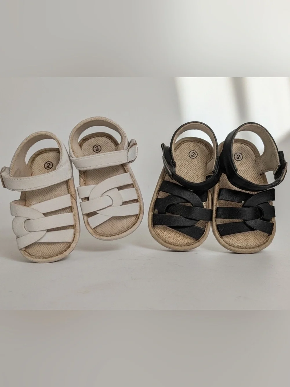 NEW 2 Pairs of Summer Sandals W/ Velcro Strap 1 White and 1 Black. Both size 2C